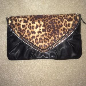 SOLD. Cheetah print clutch.