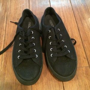 Black platform sneakers