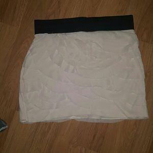 Light pink overlaying skirt mini