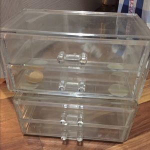 Four used acrylic drawers