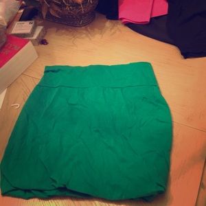 Green mini skirt! Great for at. Pattys dat!