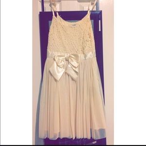Mid length cream color Dress