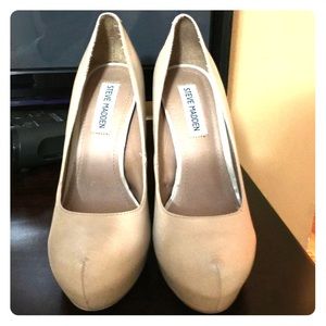 Nude color High heels  by Steve Madden .