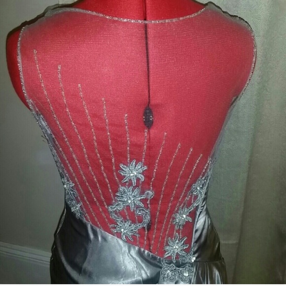 Elegant silver gown, sheer back, optional train.