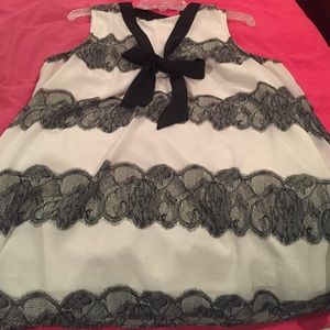 Super cute black and white tank with bow