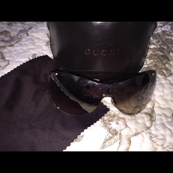 GUCCI sunglasses.