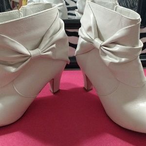 Sold on another site....White ankle boots