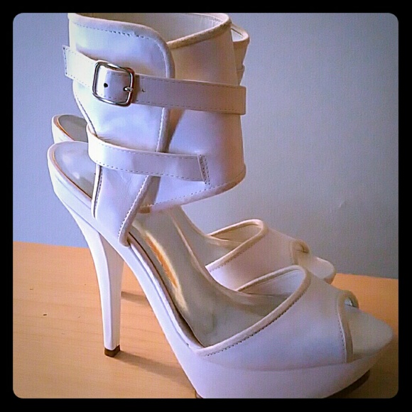 Sexy all white high heel shoe. Only worn once.