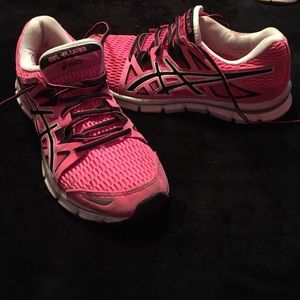 Pink Asic running shoes