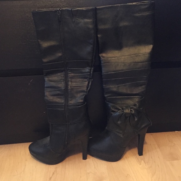 High heel knee high boots
