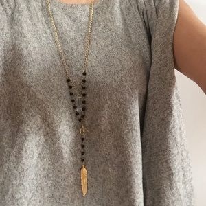 Gold charmed necklace from urban outfitters