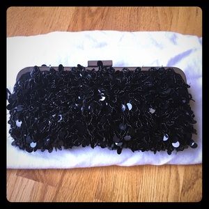 BCBG Max Azria black beaded clutch