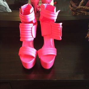 Neon pink pumps