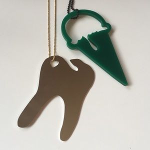 Tooth and ice cream cutout necklaces
