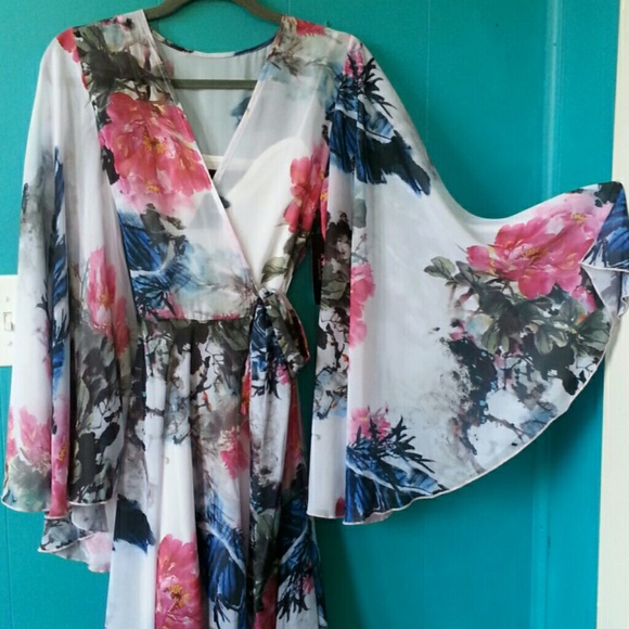 AKIRA Dresses & Skirts - *Reserved* Black Label- Floral Hi-Lo Wrap Dress