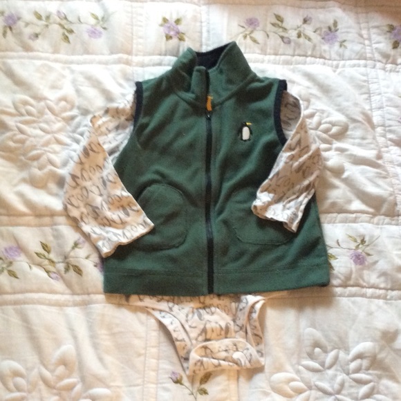 Penguin onesie with velour green vest.