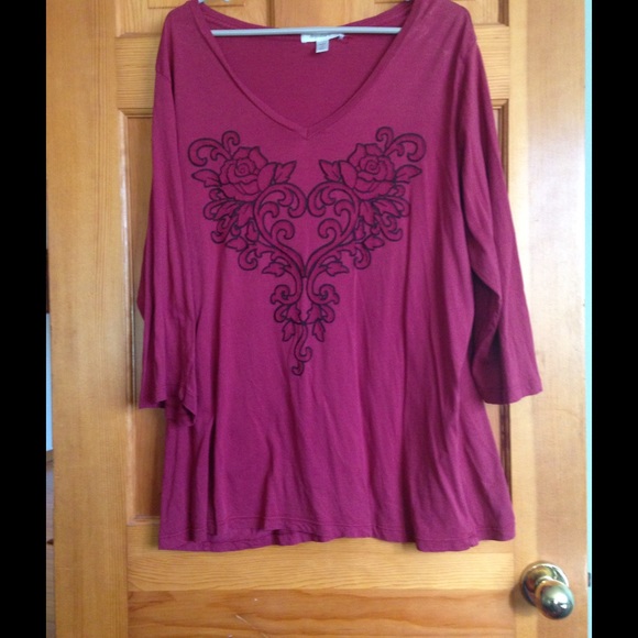 Maroon shirt.