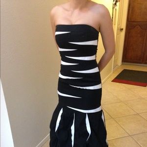 Size 10 ball gown. Worn once and dry cleaned.