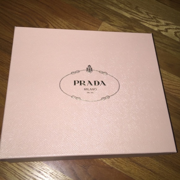 Prada heels, in box.  Deep burgundy & black heel