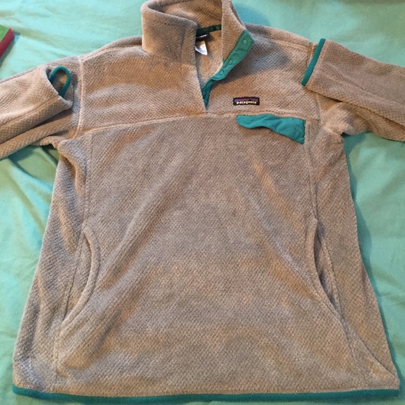 Gray and teal Patagonia fleece pullover.