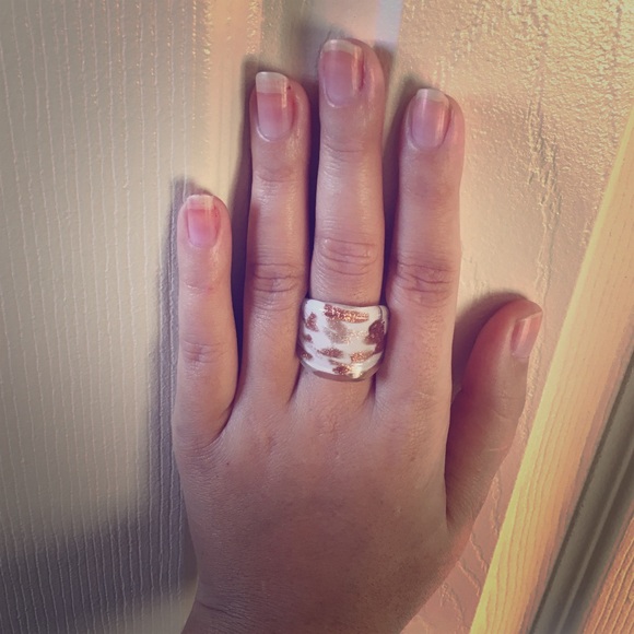 Gold and white ring.