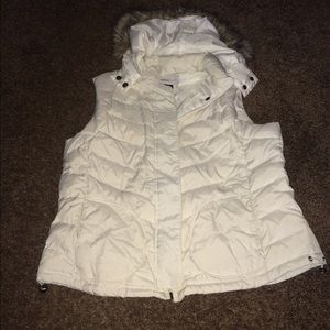 White puffer vest with brown faux fur