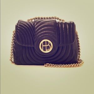 Henri Bendel quilt cross body purse.