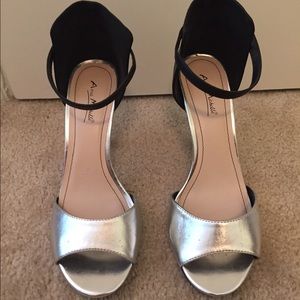 Black and silver open toe heeled sandals