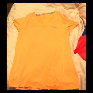 Orange Nike dry fit shirt