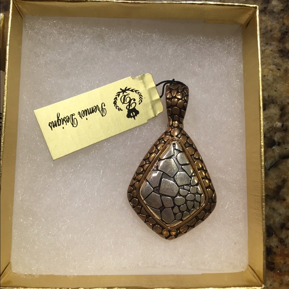 Antiqued gold and silver plated pendent