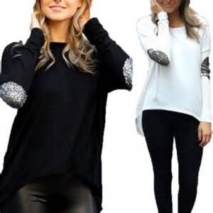 Black top with glitter patch elbows.