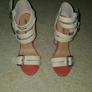 Chunky nude and burnt red (orange) sandal heels.