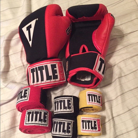 Boxing gloves and 3 sets of wraps