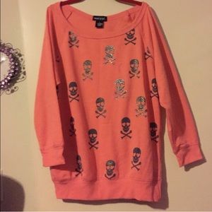orange skull crew neck shirt