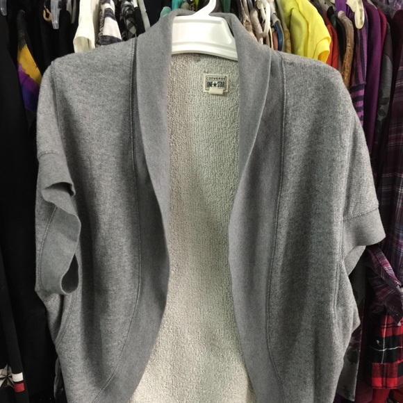 Grey Converse cocoon sweater.