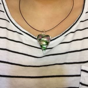 Beautiful glass necklace with art on it 🎨