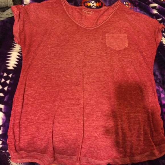 Maroon, a little bit of a v neck shirt