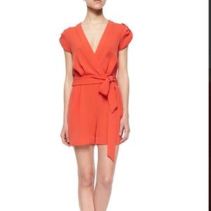 Diane Von Furstenberg bright pink orange romper.