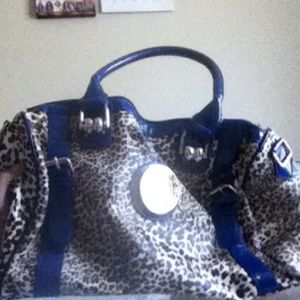 Cheetah print bag with broken zipper