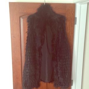 Designer Iman long black fur vest