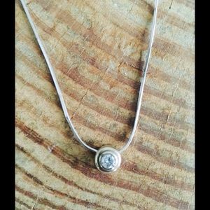 14 K White gold and diamond necklace.