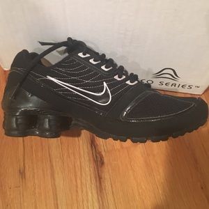 lightly worn black Nike athletic shoes