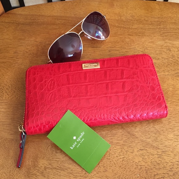 kate spade Handbags - Kate Spade red Rialto Place zip around wallet