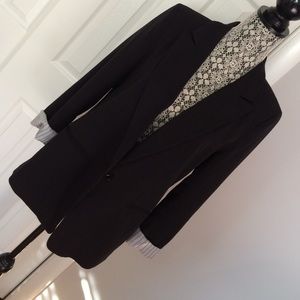 Black blazer with the striped detail