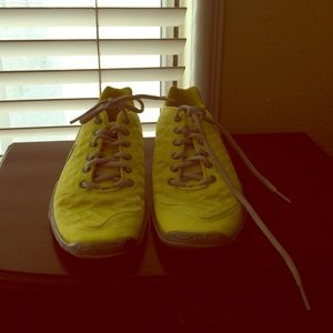 Yellow training shoes.