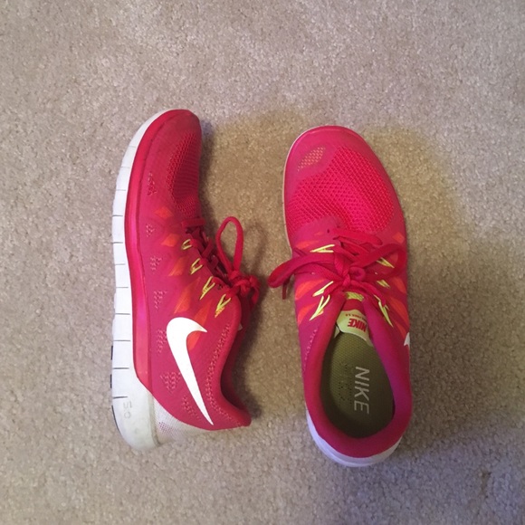 Nike women tennis shoes red but kind pinkish color
