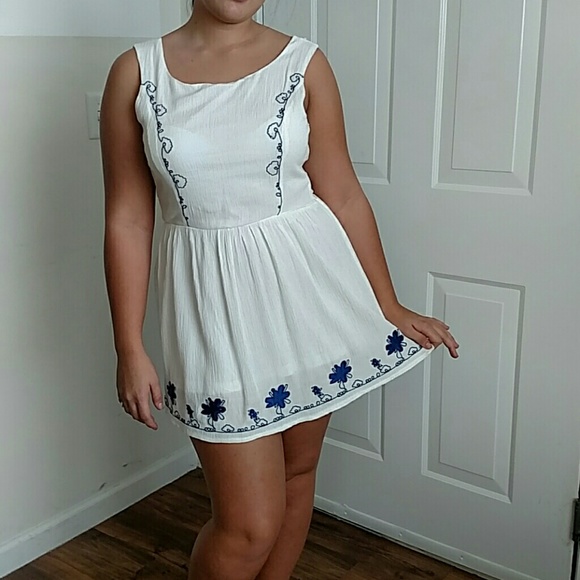 Short open back white and blue dress