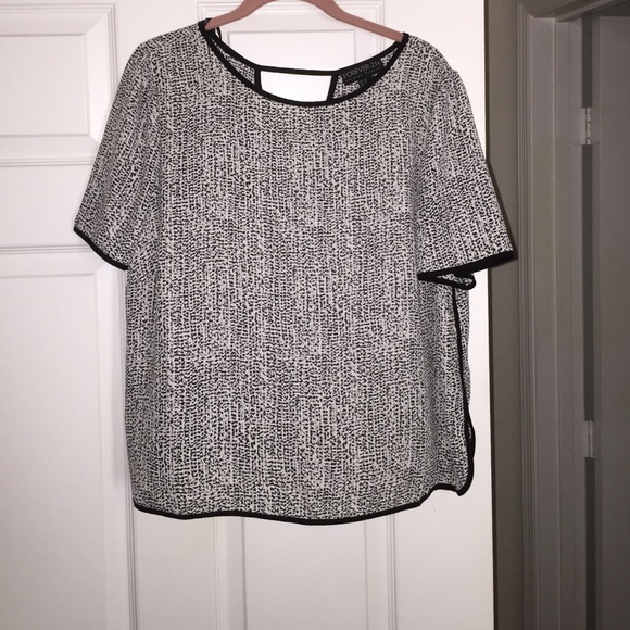 Speckled Dolphin Hem Top