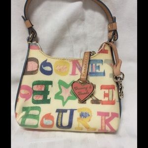 Very small Dooney & Bourke clutch.
