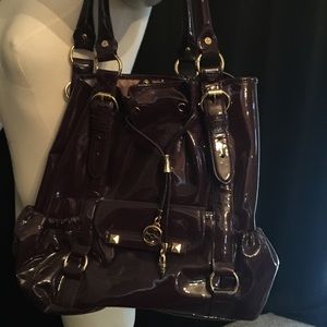 Beautiful purple bag with gold buckles